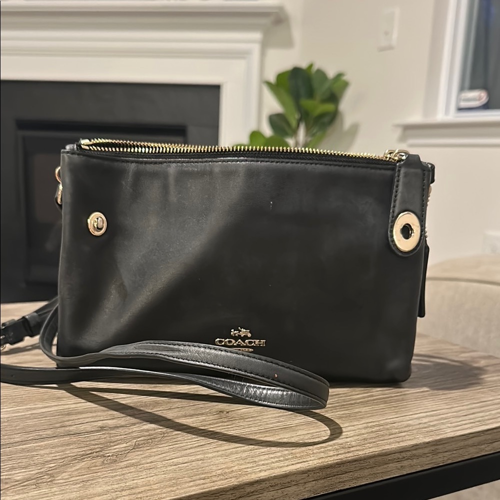 Coach Black Leather Crossbody Bag with Dual Zipper Pockets and Lock